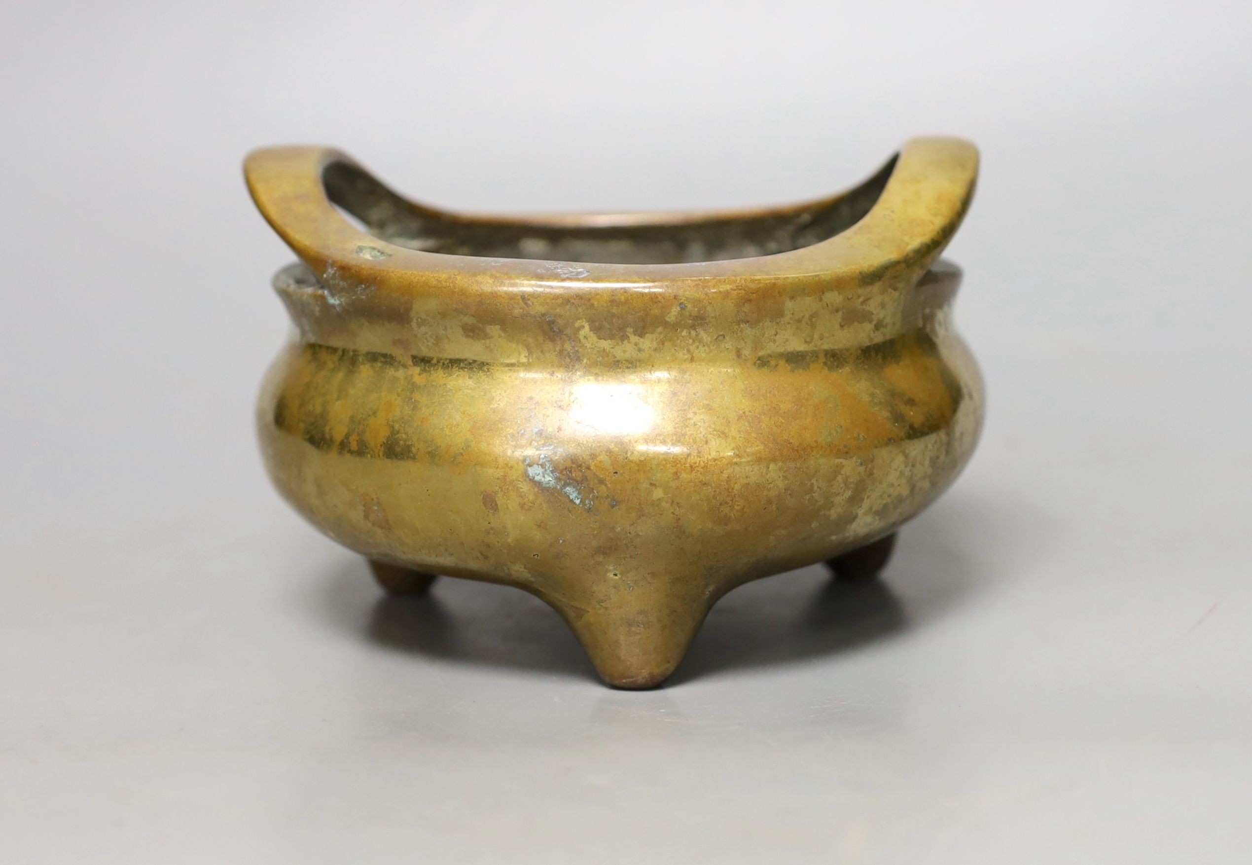 A Chinese bronze ding censer, Xuande mark but later, diameter 14cm